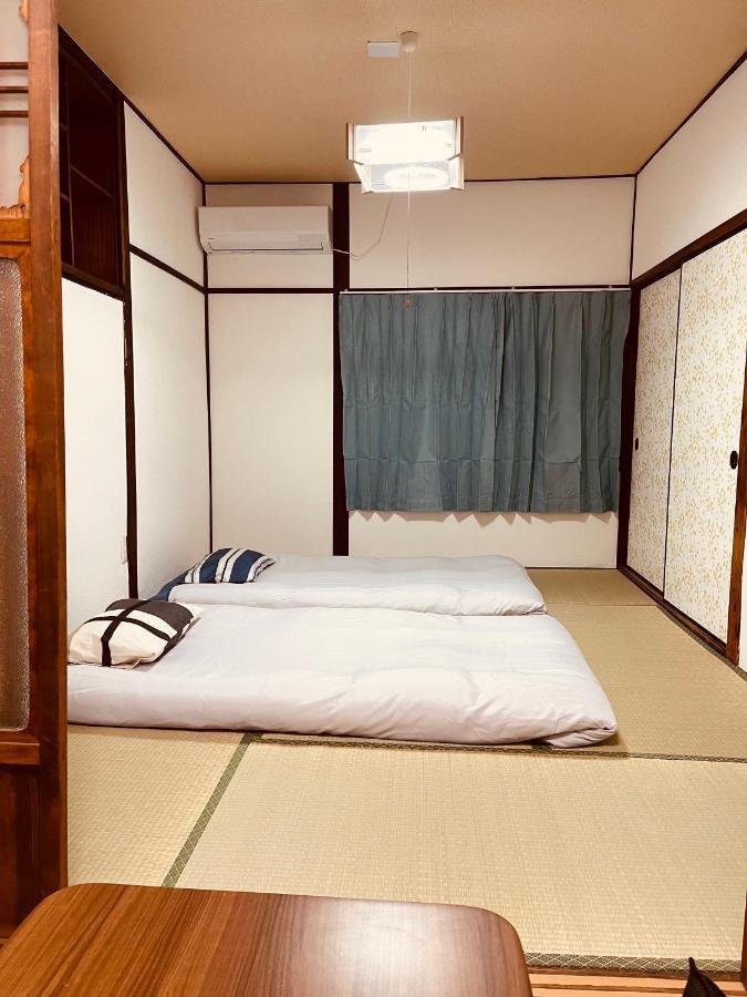 距离namba Shinsaibashi麗子民宿 أوساكا المظهر الخارجي الصورة