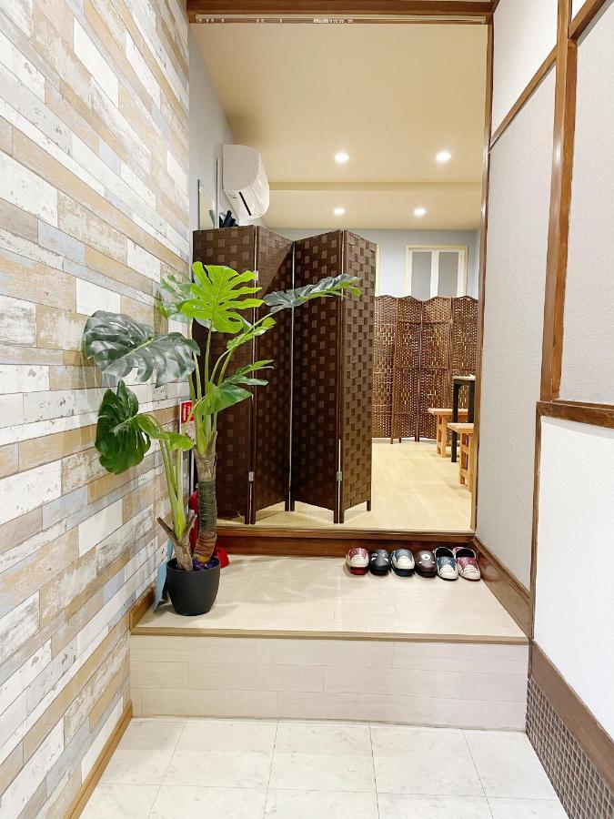 距离namba Shinsaibashi麗子民宿 أوساكا المظهر الخارجي الصورة